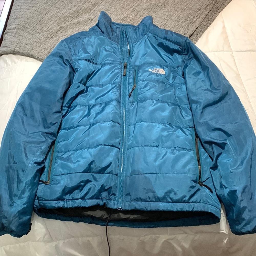 Turquoise blue north face puffer jacket. Used/good.